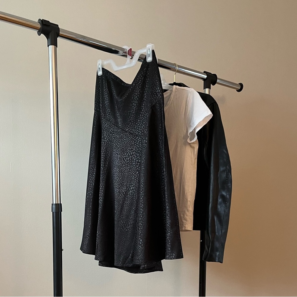 Black satin printed skirt with asymmetrical seams